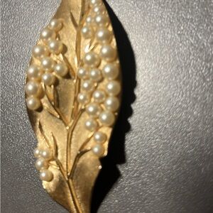 Gold and Cream Leaf Art with Intricate Details